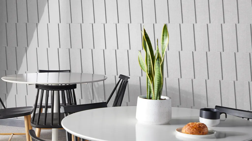Dash Tiles in Frost installed on the walls of a cafe dining area
